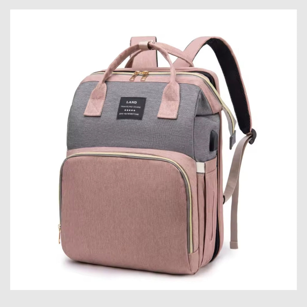 BabyNest 3-en-1™ – Le sac à langer, berceau et parc de jeu tout-en-un.